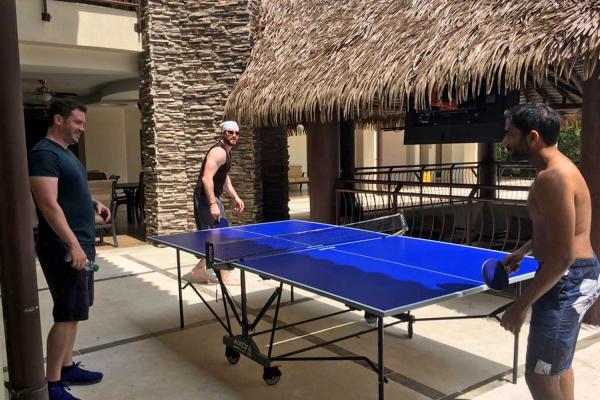 guys playing ping pong