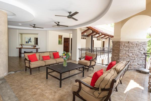 View of a second-floor balcony with a living area