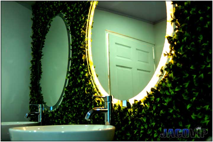 Bathroom sink with led light surrounding round mirror