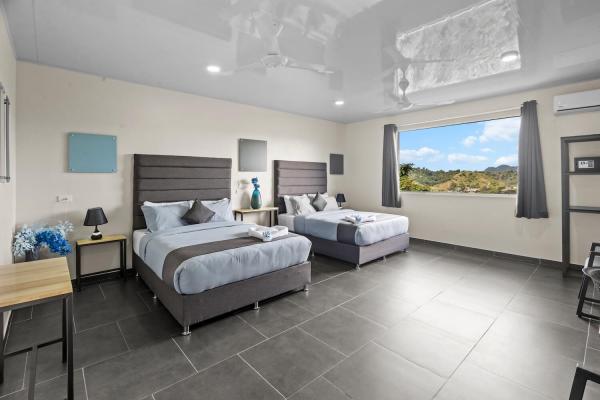 2 Queen Size Beds Sky-house-jaco-bedroom-11-1