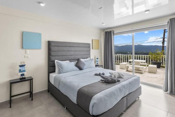 1 King Size Bed King size bed with ocean views at Sky House Jaco vacation rental