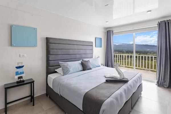 1 King Size Bed Large bed and ocean views at Jaco Sky House