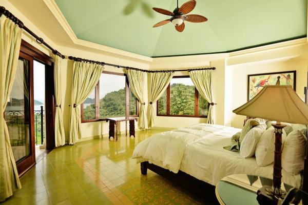 Bedroom 1 at Casa Solara with a king-sized bed and ocean view