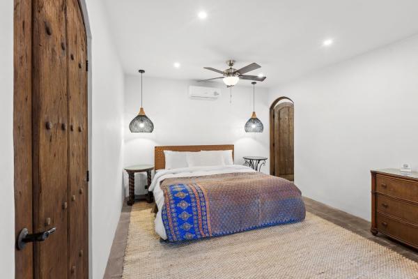 Bedroom 3 with king bed on the second floor at Villa Antigua, a luxury Costa Rica villa rental in Jaco