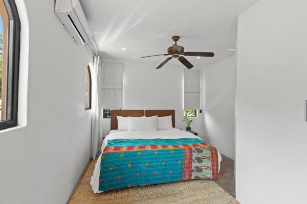 Bedroom 5 with king bed in a separate wing at Villa Antigua, a luxury Costa Rica villa rental