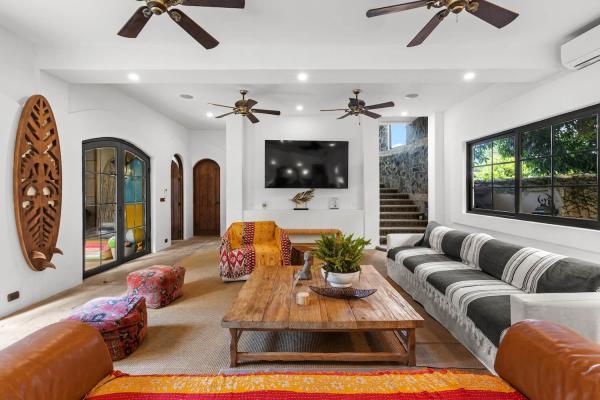 Bright living area at South Beach Villa, a luxury villa Jaco with abundant natural light and modern decor