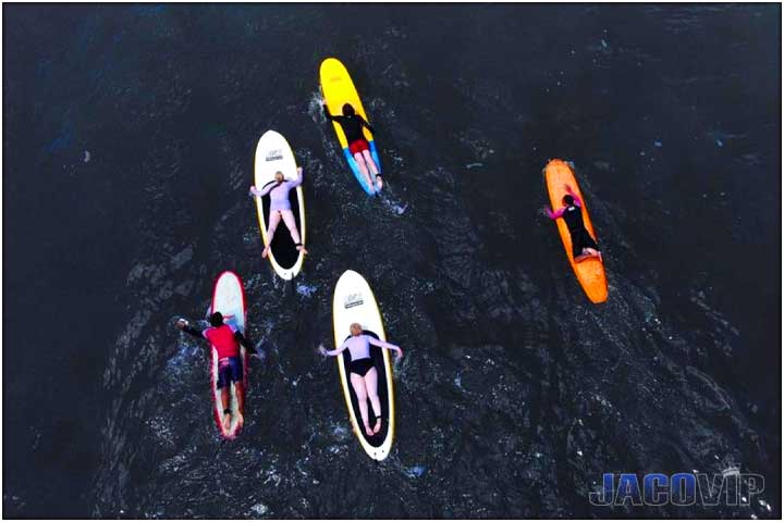 Overhead drone photo of surfers in Jaco