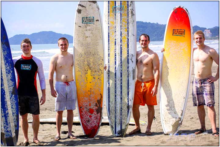 guys with surfboards in Jaco