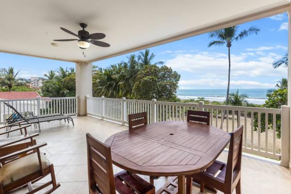 wood table and chairs on balcony