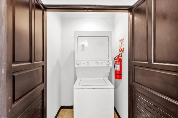Stackable washer and dryer in the condo
