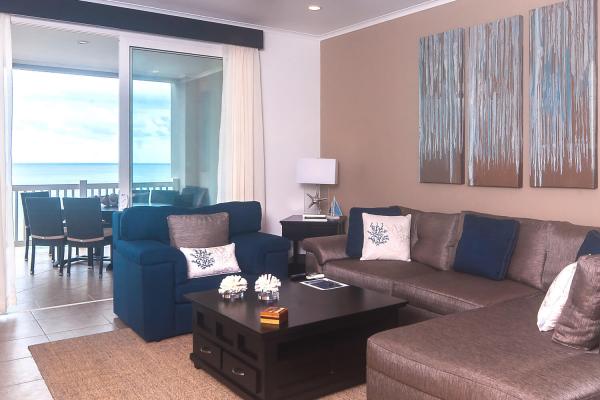 living room view of outdoor dining on the balcony