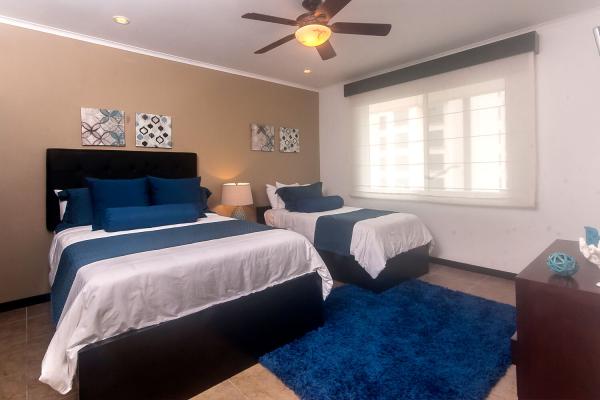 1 Queen + 1 Single Bedroom 2 at The Palms 902 condo vacation rental in Jaco Costa Rica