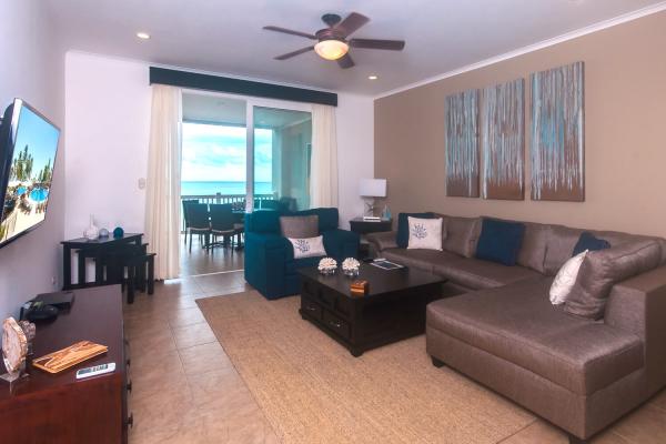 Spacious living room with ocean view at The Palms Condo 902 Jaco Beach