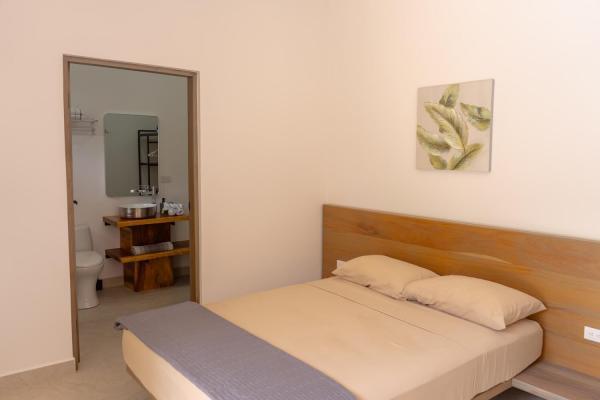 1 Queen Bed First floor bedroom 2 with queen bed and en-suite bathroom