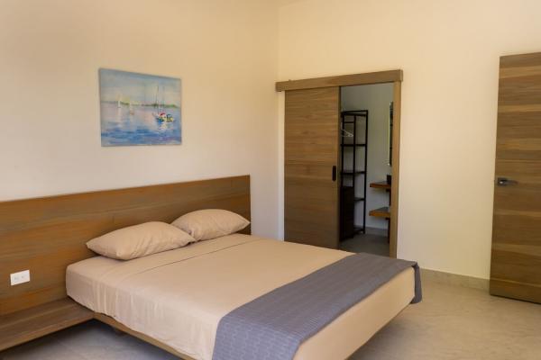 1 Queen Bed Second floor bedroom 4 with queen bed and en-suite door
