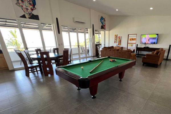 Pool table in living room area