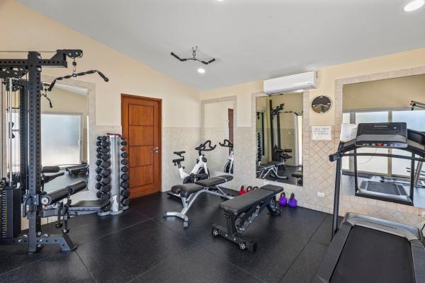 Onsite fitness center with cardio and strength equipment
